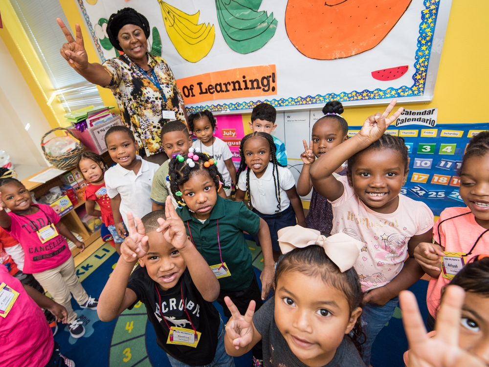 Image of HCDE staff with children.